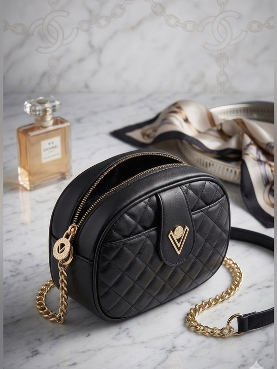 Valentino Orlandi Handbags - Valentino Orlandi Black Quilted Crossbody Oval Camera Bag NWT Retail $129